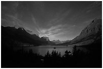 Saint Mary Lake at night with light from rising moon. Glacier National Park ( black and white)