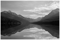 Mountains and clouds with reflections, Bowman Lake. Glacier National Park ( black and white)