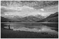 Visitor looking, Kintla Lake. Glacier National Park ( black and white)