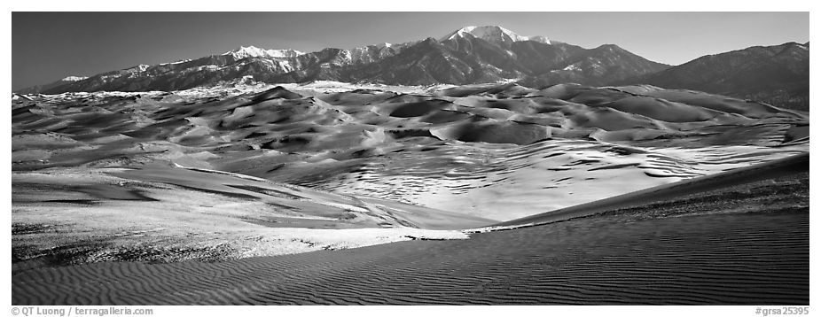 Landscape of sand dunes and mountains in winter. Great Sand Dunes National Park and Preserve (black and white)