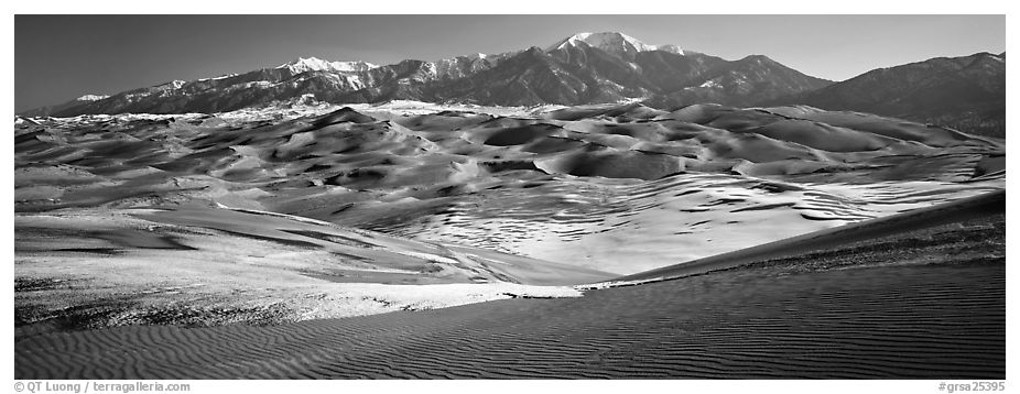 Landscape of sand dunes and mountains in winter. Great Sand Dunes National Park (black and white)