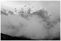 Snowy peak appearing between clouds. Great Sand Dunes National Park and Preserve ( black and white)