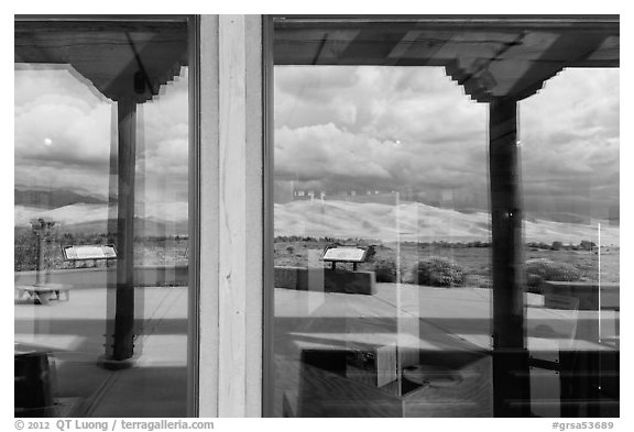 Dune field, visitor center window reflexion. Great Sand Dunes National Park and Preserve (black and white)