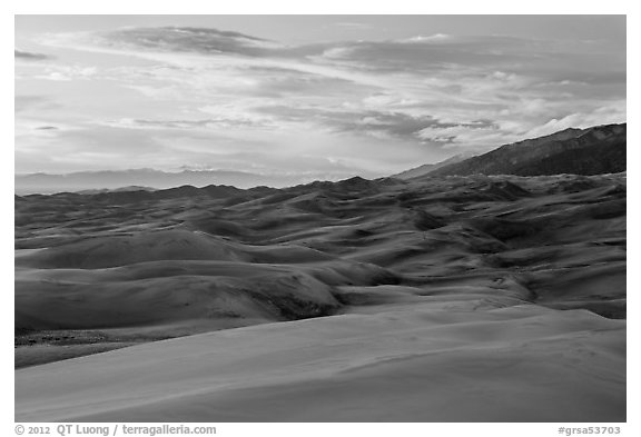 Dunes and sunset clouds. Great Sand Dunes National Park, Colorado, USA.