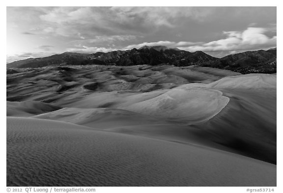 Dunes and Sangre de Cristo mountains at dusk. Great Sand Dunes National Park, Colorado, USA.