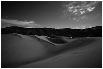 Dunes and mountains at night. Great Sand Dunes National Park, Colorado, USA. (black and white)