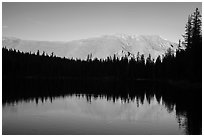 Mountain reflection and line of trees, Sand Creek Lake. Great Sand Dunes National Park and Preserve ( black and white)