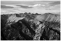 Rocky Sangre de Cristo mountain brightened by aspens in fall foliage. Great Sand Dunes National Park and Preserve ( black and white)