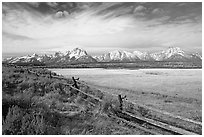 Fence and Teton range in fall. Grand Teton National Park, Wyoming, USA. (black and white)