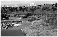 Stream, with Mt Moran emerging from ridige, late fall. Grand Teton National Park, Wyoming, USA. (black and white)