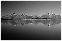 The Teton range above blue Jackson lake. Grand Teton National Park, Wyoming, USA. (black and white)