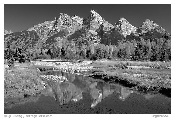 Grand Teton and fall colors reflected at Schwabacher landing. Grand Teton National Park, Wyoming, USA.