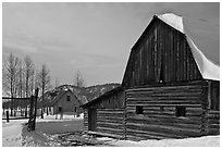 Moulton barn and house in winter. Grand Teton National Park, Wyoming, USA. (black and white)