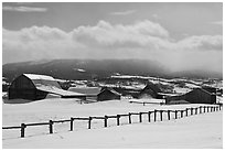 Chambers and Perry homesteads in winter, Mormon Row. Grand Teton National Park, Wyoming, USA. (black and white)