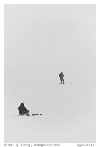 Ice fishermen on Frozen Jackson Lake. Grand Teton National Park, Wyoming, USA.