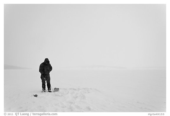 Ice fishing on Jackson Lake. Grand Teton National Park, Wyoming, USA.