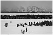 Snake River plain and Teton Range foothills in winter. Grand Teton National Park, Wyoming, USA. (black and white)