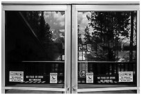 Jackson Lake and Tetons, Colter Bay Visitor Center window reflexion. Grand Teton National Park ( black and white)