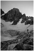 Mountaineer stands below Middle Teton and glacier. Grand Teton National Park ( black and white)