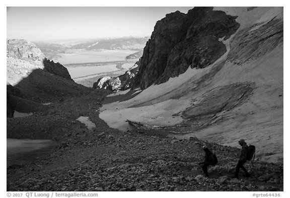 Mountaineers hiking down rocky trail, Garnet Canyon. Grand Teton National Park (black and white)