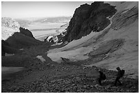 Mountaineers hiking down rocky trail, Garnet Canyon. Grand Teton National Park ( black and white)