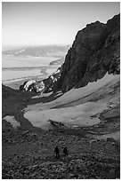 Mountaineers hiking down rocky slope, Garnet Canyon. Grand Teton National Park ( black and white)