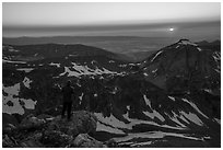 Mountaineer watches sunset from Lower Saddle. Grand Teton National Park ( black and white)