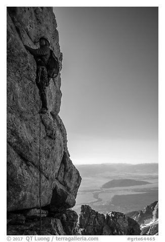 Climber leading Exum Direct route on Grand Teton. Grand Teton National Park (black and white)