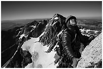 Mountaineer looks up while climbing Grand Teton. Grand Teton National Park ( black and white)