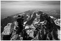 Climber coils rope on Upper Exum Ridge, Grand Teton. Grand Teton National Park ( black and white)