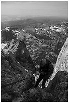 Climber rappels down Sargeant's Chimney on Grand Teton. Grand Teton National Park ( black and white)
