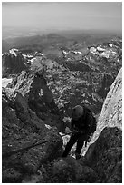 Climber rappels down Sargeant's Chimney on Grand Teton. Grand Teton National Park ( black and white)