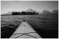 Kayak pointing at island in Colter Bay. Grand Teton National Park ( black and white)