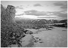 Rock tower and neve at sunset, Rock Cut. Rocky Mountain National Park, Colorado, USA. (black and white)