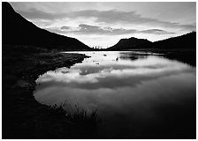 Pond with cloud reflection at sunrise, Horsehoe Park. Rocky Mountain National Park, Colorado, USA. (black and white)