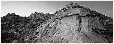 Badlands scenery with caprocks. Theodore Roosevelt  National Park (Panoramic black and white)