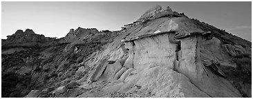 Badlands scenery with caprocks. Theodore Roosevelt National Park (Panoramic black and white)