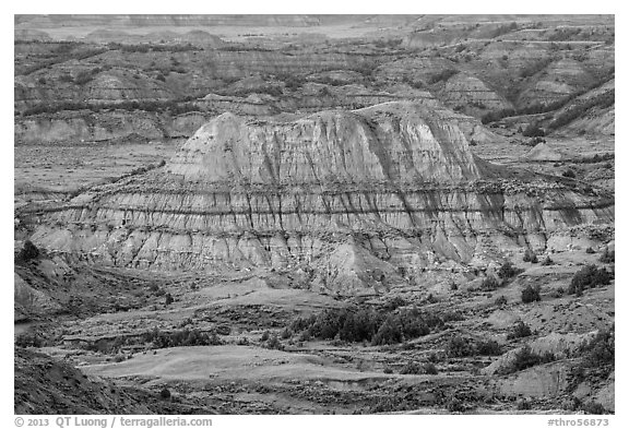 Butte with red scoria cap, Painted Canyon. Theodore Roosevelt National Park, North Dakota, USA.