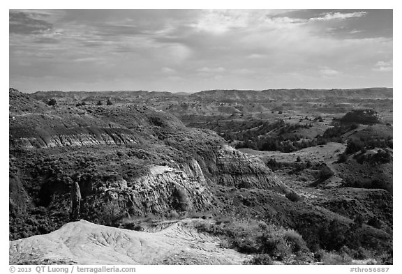 Park visitor looking, North Dakota Badlands Overlook. Theodore Roosevelt National Park (black and white)