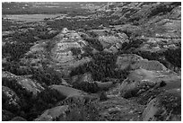 Badlands in summer at dusk. Theodore Roosevelt National Park ( black and white)