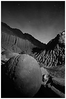 Cannonball and badlands at night. Theodore Roosevelt National Park, North Dakota, USA. (black and white)