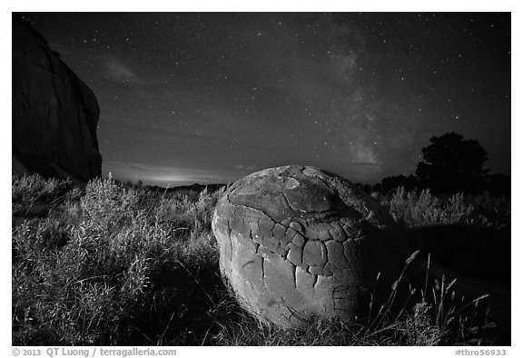 Cannonball, grasses and Milky Way. Theodore Roosevelt National Park, North Dakota, USA.