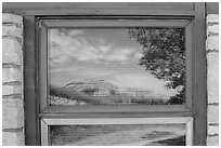 North Unit Visitor Center window reflexion. Theodore Roosevelt National Park, North Dakota, USA. (black and white)