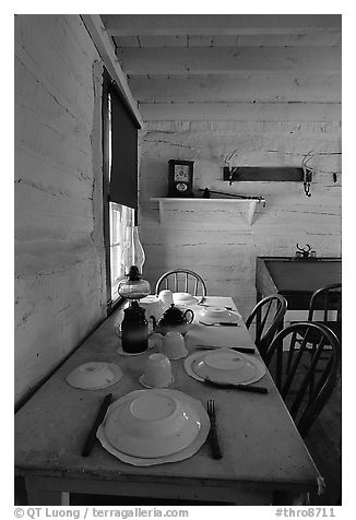 Dining table inside Roosevelt's Maltese Cross Cabin. Theodore Roosevelt National Park, North Dakota, USA.