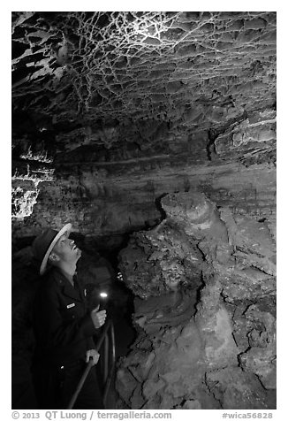 Ranger lights up boxwork in the Elks Room. Wind Cave National Park (black and white)