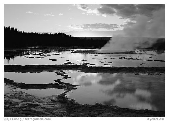 Great Fountain Geyser with residual steam at sunset. Yellowstone National Park (black and white)