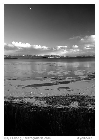 Yellowstone Lake with frozen shores, sunset. Yellowstone National Park, Wyoming, USA.