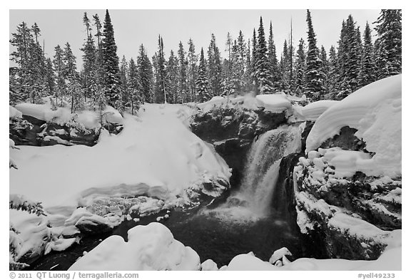Snowy landscape with waterfall. Yellowstone National Park (black and white)