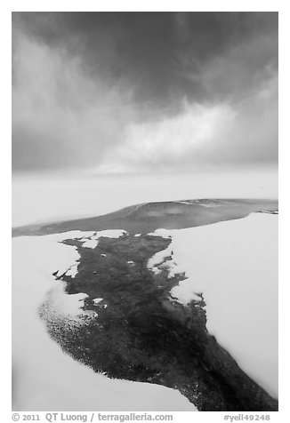 Thermal stream at edge of Yellowstone Lake in winter. Yellowstone National Park, Wyoming, USA.