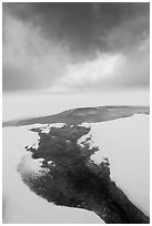 Thermal stream at edge of Yellowstone Lake in winter. Yellowstone National Park, Wyoming, USA. (black and white)